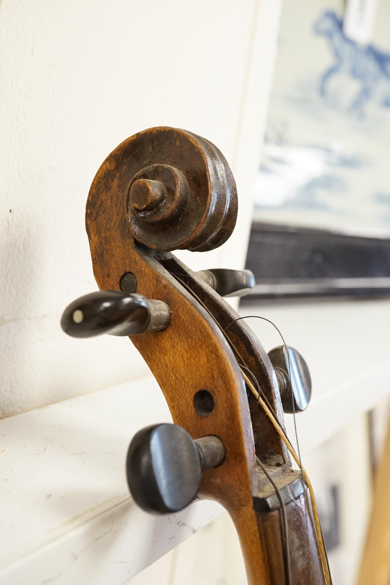 A 19th century violin, and a cased Boosey & Hawkes clarinet